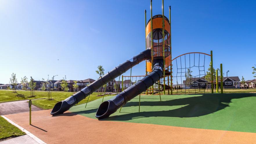Vibrant playground equipment with large slide at Jackson Park