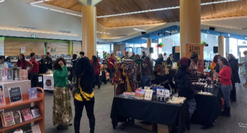 Cultural exhibit with booths and food