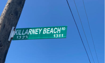 Sign that says Killarney Beach Road 