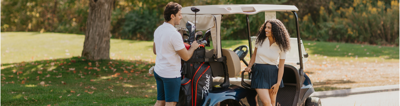 Couple enjoying a round of golf in Innisfil, ON at Friday Harbour Resort.