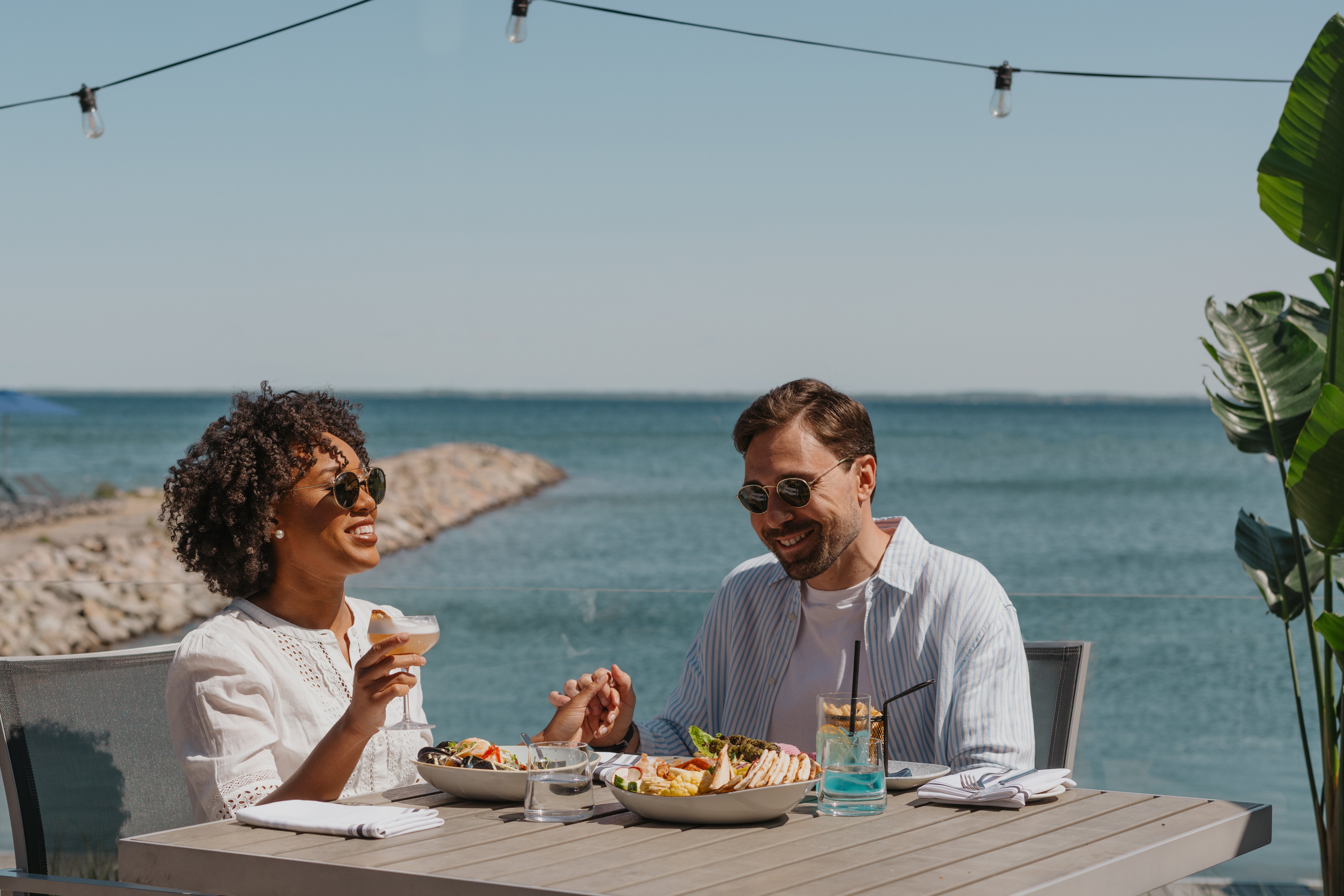 Couple enjoying a lakeside dinner in Innisfil, along the beautiful shores of Lake Simcoe.