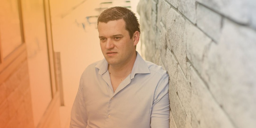 Man looking away in staircase