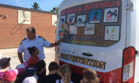 Fire prevention officer teaching kids