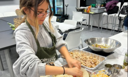 youth preparing food in community kitchen