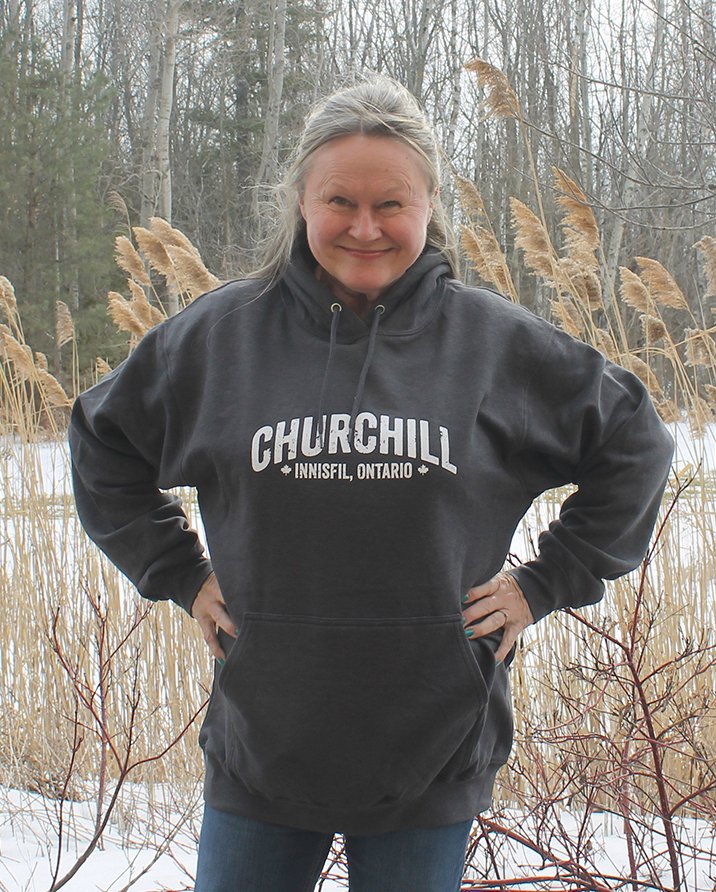 Girl wearing hoodie that says Churchill