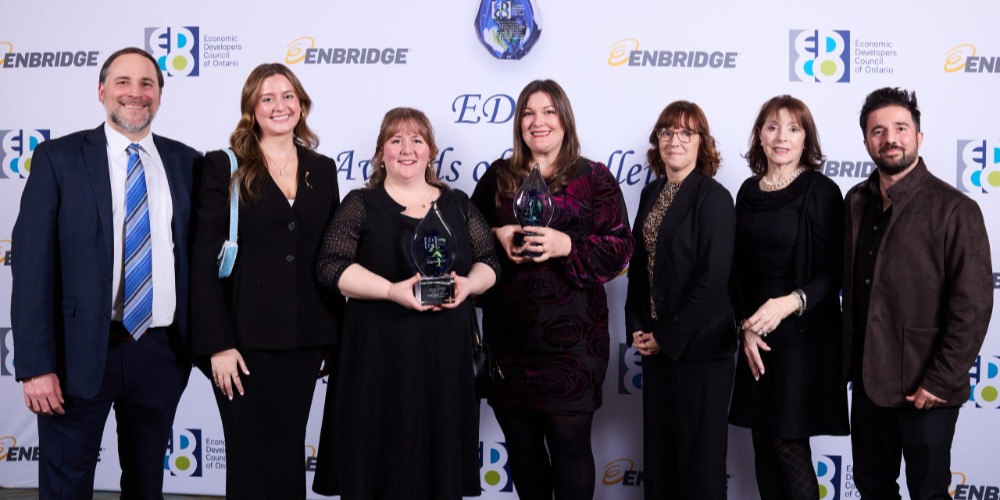 Innisfil Economic Development team posing with awards. 