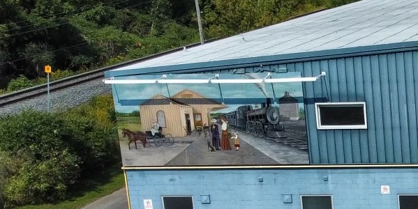 Historic mural painted outside arena