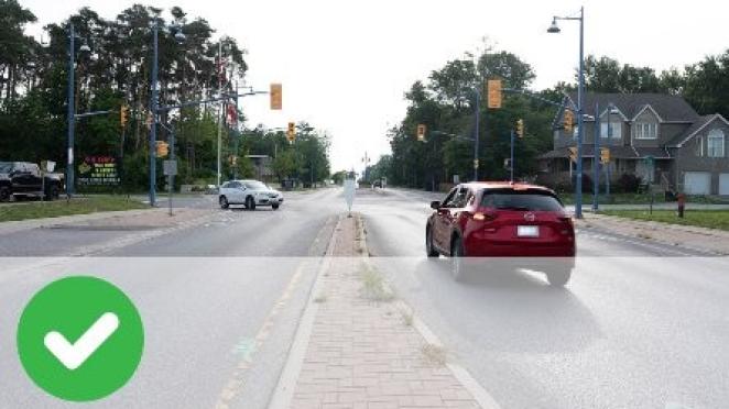 Cars driving near intersection in Innisfil