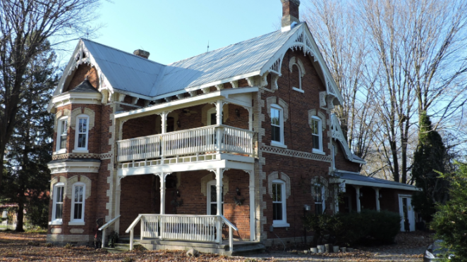 Two story home in the Gothic Revival style